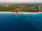 Top View on Beautiful thatch stilt house restaurant at Zanzibar Kendwa beach at evening time in Blue Water of Indian