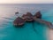 Top View on Beautiful thatch stilt house restaurant at Zanzibar Kendwa beach at evening time in Turquoise Water of