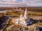 Top view beautiful white highest Church of Belarus, autumn Sunny day