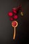 Top view of Beetroot Powder in wooden spoon