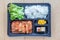 Top view of bento to-go plastic box, streamed Japanese rice with