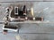 Top view of black clarinet instrument, jazz instrument, instrument repair concept, dismantled and placed on a wooden table.