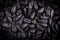 Top view of black sunflower seeds. Organic natural food background. Sunflower seeds are suitable for microgreens sprout