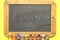 top view of blackboard with education word with colorful paints. school education concept. flat lay