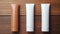 Top view of blank cosmetics tubes on wooden podium.Earth tones,eco friendly concept