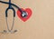 Top view blue stethoscope on yellow background. For check heart or health check up concept