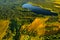 Top view of Bolta lake in the forest in the Braslav lakes National Park at dawn, the most beautiful places in Belarus.An island in