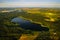Top view of Bolta lake in the forest in the Braslav lakes National Park at dawn, the most beautiful places in Belarus.An island in