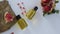 Top view of bottles with pomegranate seed essential oil