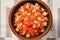 top view of a bowl full of cubed radish kimchi