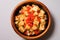 top view of a bowl full of cubed radish kimchi