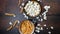 Top view of bowl of popcorn, chips and Tv remote on table