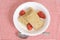 Top view bowl shredded wheat with strawberries