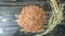 Top view of Brown rice on black wood, rice plant with paddy on