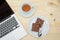 Top view of brownie and tea cup on wooden table