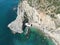 Top view of a building near a rocky cliff on the coast of Sesimbra in Portugal