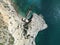 Top view of a building near a rocky cliff on the coast of Sesimbra in Portugal