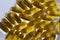 Top view of Bunch of Yellow fish oil capsules, omega 3