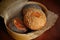 Top view on buns with sesame and poppy seeds in burlap basket