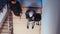 Top view of businessman getting fired sitting on staircase