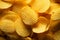 Top view captures the texture of crispy potato chips background