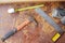 Top view carpentry tools on the dirty wooden desk with sawdust