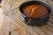 Top view of carrot cake fresh from the oven, on rack and rustic wood