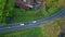 Top view cars riding countryside terrain. Asphalt roadway hurrying transport