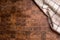 Top of view checkered tablecloth on empty wooden butcher board