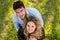 Top view. cheerful couple, standing barefoot in the grass looking at camera.