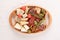 Top view on cheese and meat snacks platter. Traditional Italian antipasti board with variety of cheeses, sausages