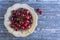 Top view of cherries in vintage bowl with copy space