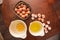 Top view of Chicken eggs in a basket, egg yolks in a bowl, egg white in a bowl. home kitchen