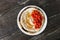 Top view Chickpea hummus served flatbread cherry tomatoes wooden