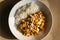 Top view of chickpeas curry dish on wood table with natural light and basmati rice. Healthy organic vegetarian food with cheese