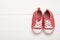 Top view of child`s booties on white background, space for text