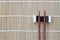 Top view chopsticks on bamboo mat