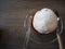 Top view Choux cream placed on a glass plate with fork and spoon