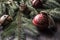 Top of view christmas decorations jingle bells fir tree pine cones on free concrete background