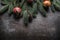 Top of view christmas decorations jingle bells fir tree pine cones on free concrete background