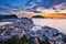 Top view of the city of Alesund at sunset .