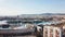 Top view of the city with the Bay and yachts. Stock. Beautiful aerial view of city port. Aerial view of white yachts and