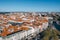 .Top view of the city, narrow streets and roofs of houses with red tiles Cascais