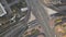 Top view city traffic of highway, logistics. Clip. Aerial top view of road junction from above, automobile traffic and