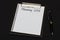 Top view of clipboard and white sheet written with Planning 2018 on black background. Business Concept