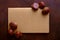 Top view of a close notebook with hazelnuts isolated on a brown background