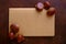 Top view of a close notebook with hazelnuts isolated on a brown background