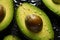 Top view close up cut in half avocados with seeds in natural light, close up.