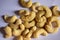 Top View of Closeup Cashew Nuts On isolated White Background