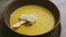 Top view closeup cheese cream soup decorated with mushrooms and dried bread